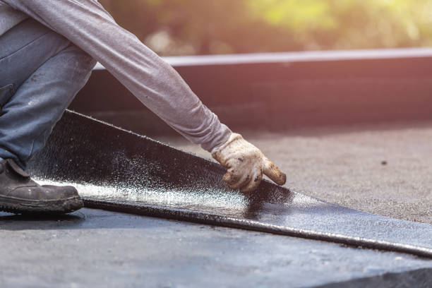 Professional Basement Waterproofing technician working in Greenfield, TN